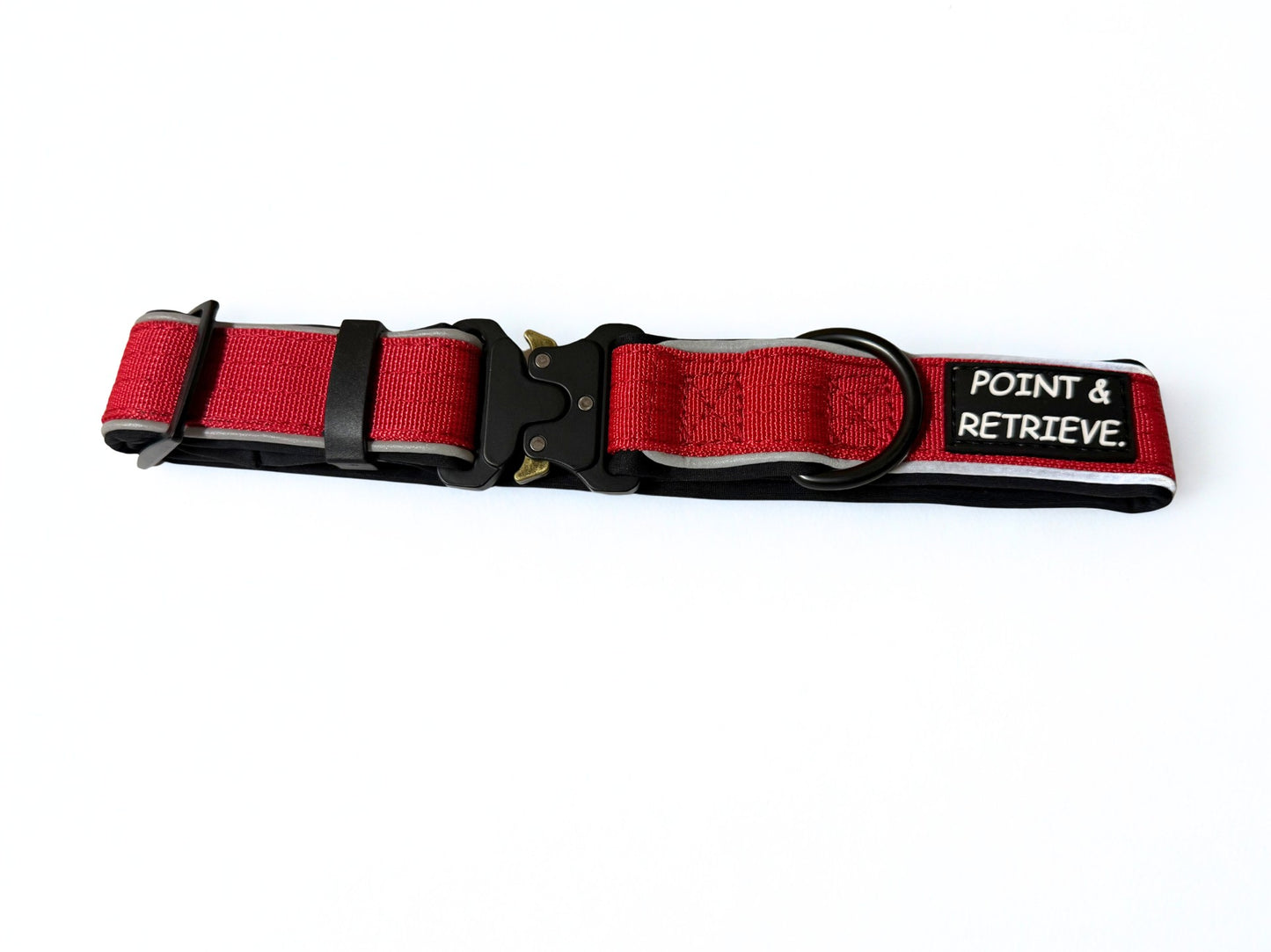 Red dog collar with black buckle and 'Point & Retrieve' label on a white background
