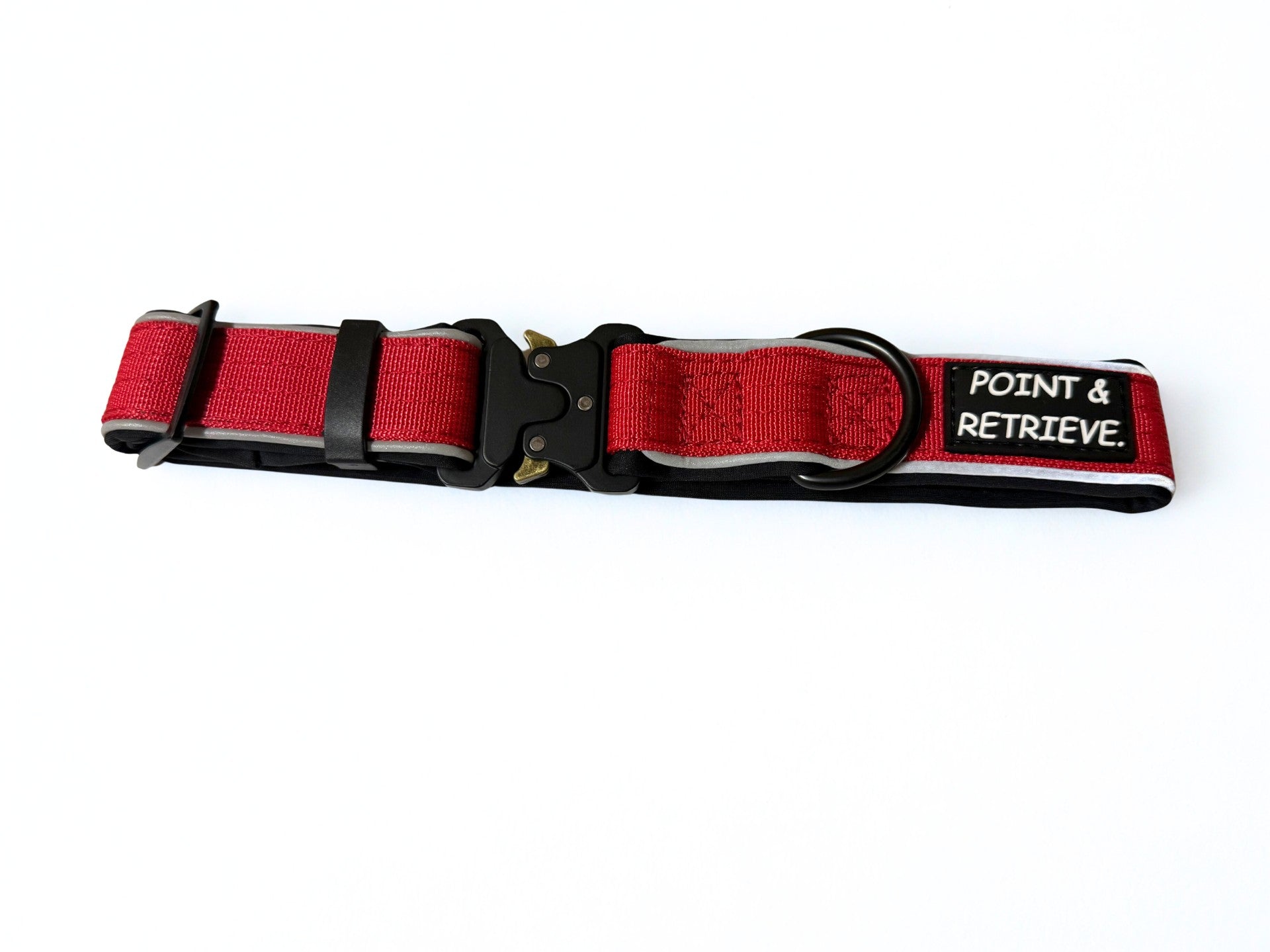 Red dog collar with black buckle and 'Point & Retrieve' label on a white background