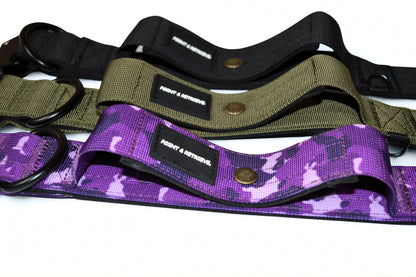 Three tactical collars in black, green, and purple camouflage pattern on a white background